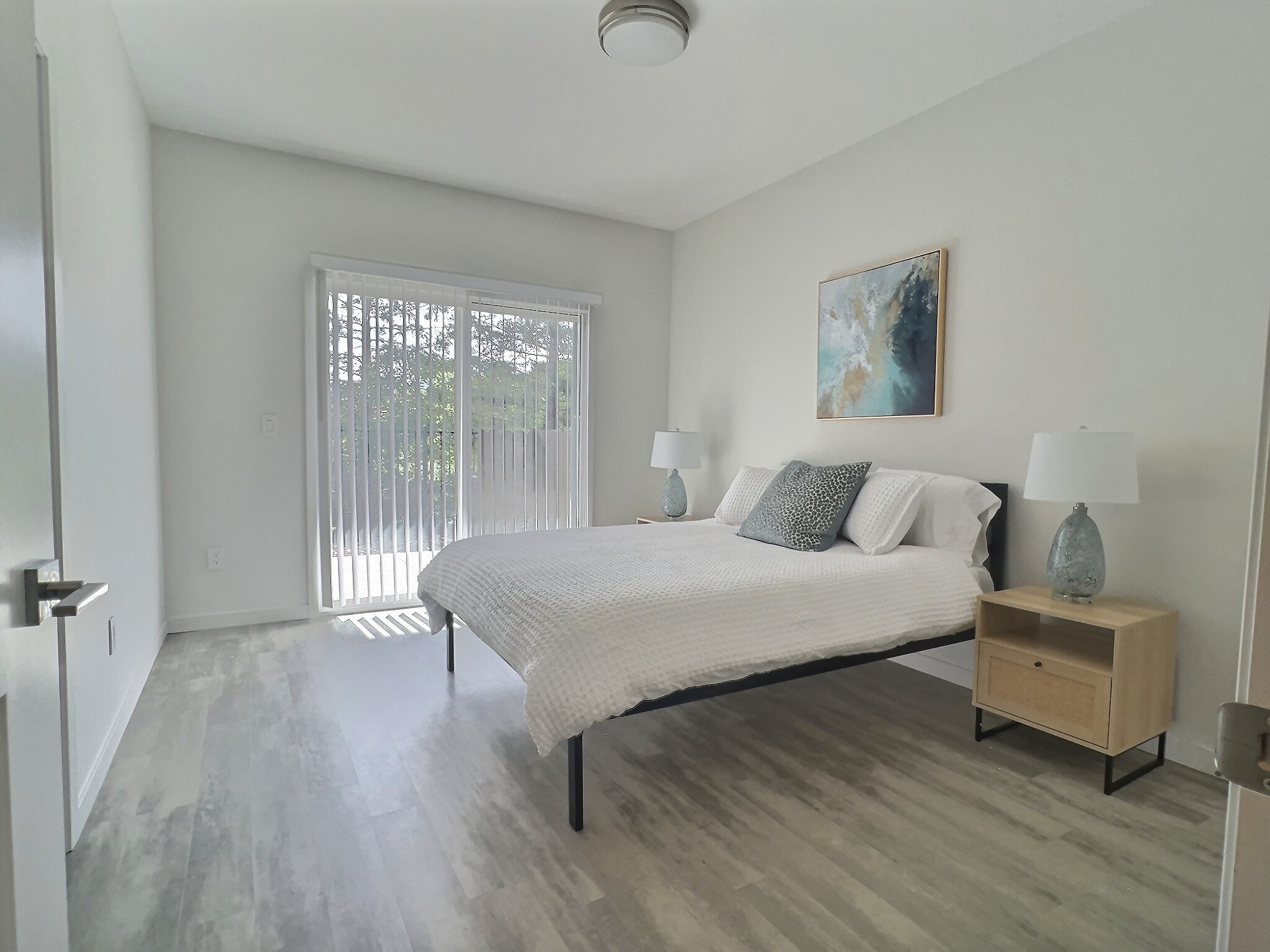 Cabernet Suite master bedroom with balcony slider