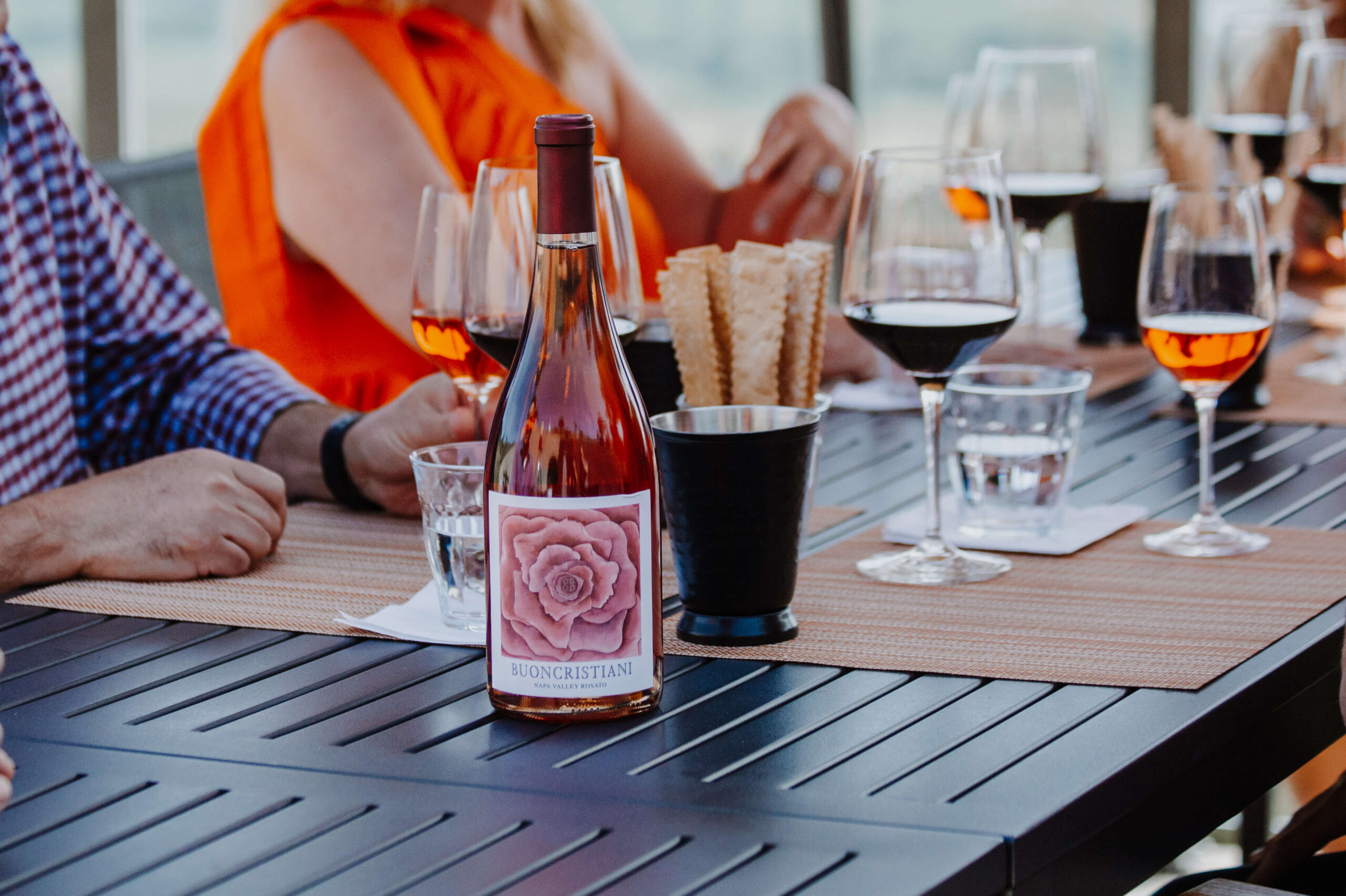 Rosé bottle on the patio table with valley views